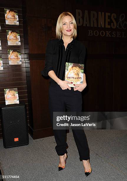 Actress Kate Hudson signs copies of "Pretty Happy: Healthy Ways To Love Your Body" at Barnes & Noble at The Grove on February 22, 2016 in Los...