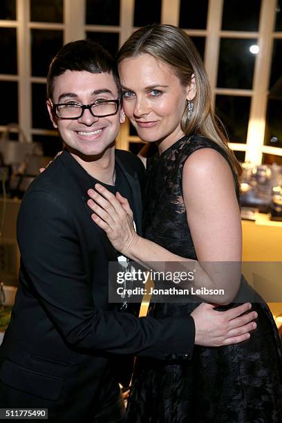 Fashion designer Christian Siriano and actress Alicia Silverstone attend a dinner for the launch of the first luxury handbag collection by Christian...