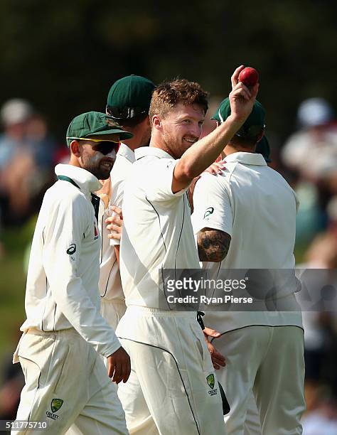Jackson Bird of Australia raises the ball after finishing with five wickets during day four of the Test match between New Zealand and Australia at...