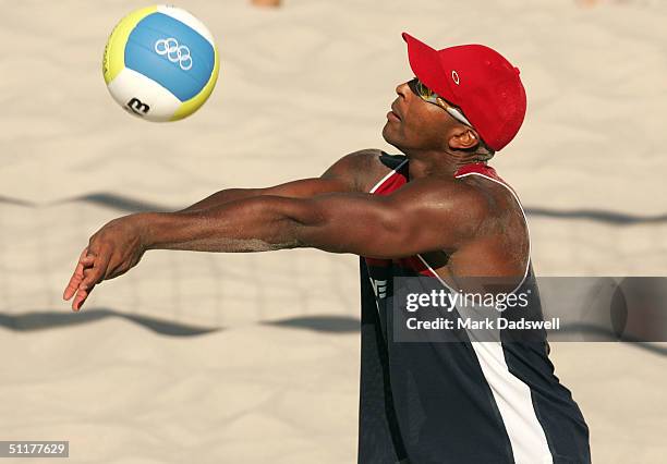 Dain Blanton of the USA returns the ball in the men's Beach Volleyball preliminary match on August 16, 2004 during the Athens 2004 Summer Olympic...