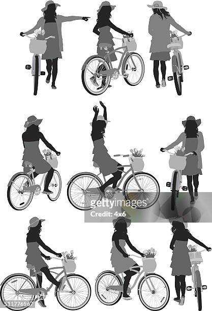 various poses of women cyclist - bike hand signals stock illustrations
