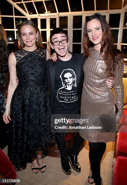 Actress Alicia Silverstone, fashion designer Christian Siriano, and actress Juliette Lewis attend a dinner for the launch of the first luxury handbag...