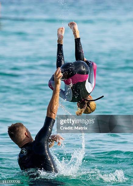 Celebrity chef, Pete Evans enjoys a surf at Bondi Beach with daughters Chilli and Indii on February 22, 2016 in Sydney, Australia.