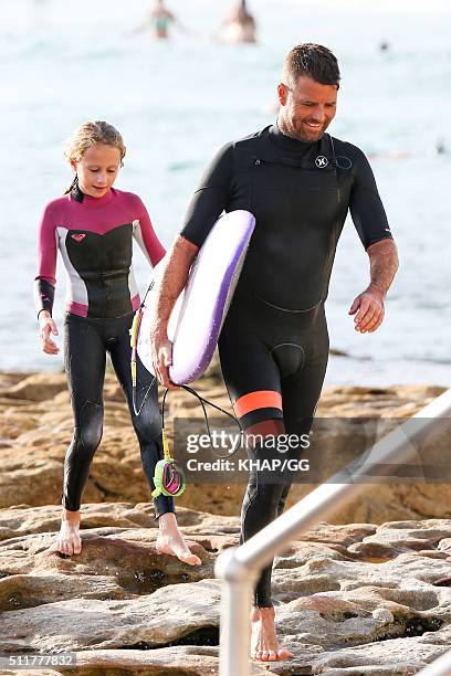 Paleo advocate and celebrity chef, Pete Evans enjoys surfing at Bondi Beach with his daugters Chilli and Indii on February 22, 2016 in Sydney,...