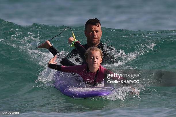 Paleo advocate and celebrity chef, Pete Evans enjoys surfing at Bondi Beach with his daugters Chilli and Indii on February 22, 2016 in Sydney,...