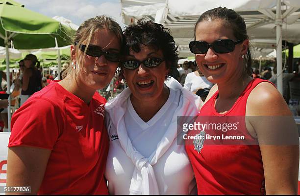 The mother of Speedo swimmer Michael Phelps, Debbie Phelps , poses with his sisters Whitney Phelps and Hilary Phelps during the Athlete Family Beach...