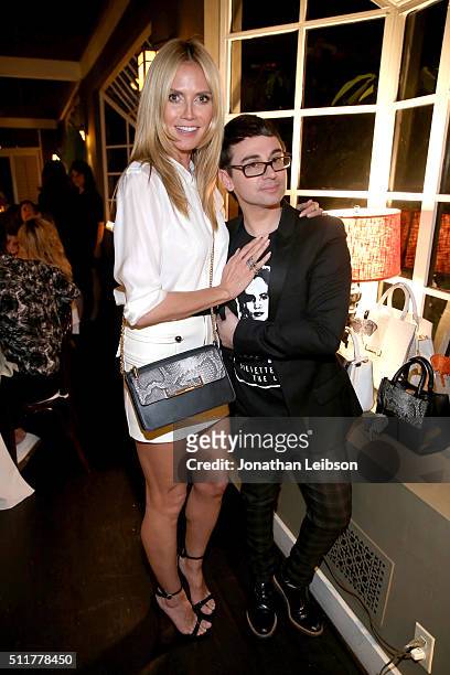 Model Heidi Klum and fashion designer Christian Siriano attend a dinner for the launch of the first luxury handbag collection by Christian Siriano at...