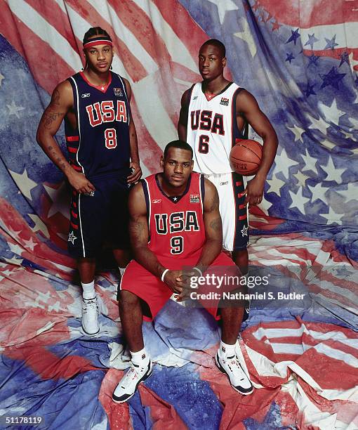 Carmelo Anthony, LeBron James and Dwyane Wade of Team USA pose for a portrait at the University of Florida Arena on July 26, 2004 in Jacksonville,...