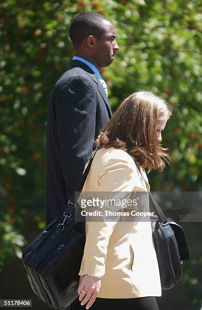 Los Angeles Lakers star Kobe Bryant leaves the Eagle County Justice Center for a lunch break on the last day of hearings before the August 27 trial...