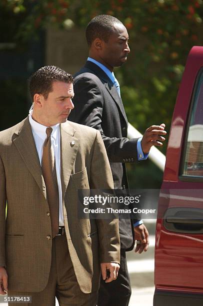 Los Angeles Lakers star Kobe Bryant leaves the Eagle County Justice Center for a lunch break on the last day of hearings before the August 27 trial...