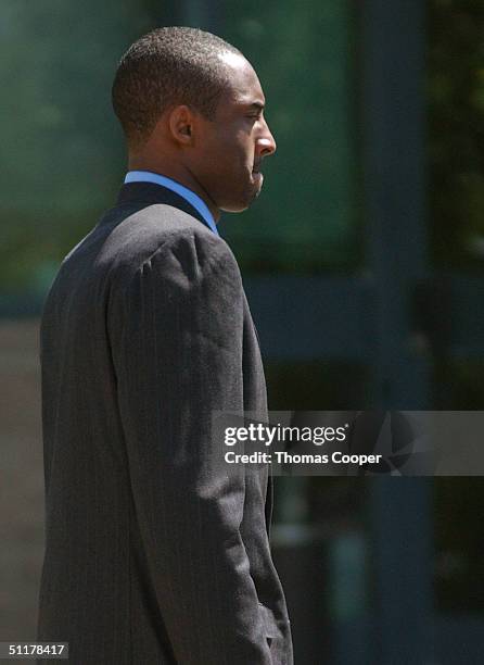 Los Angeles Lakers star Kobe Bryant leaves the Eagle County Justice Center for a lunch break on the last day of hearings before the August 27 trial...