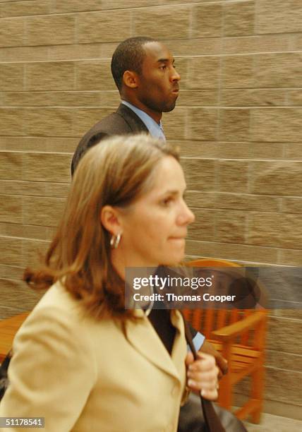 Los Angeles Lakers star Kobe Bryant and his attorney Pamela Mackey leave the Eagle County Justice Center August 16, 2004 courtroom for a lunch break...