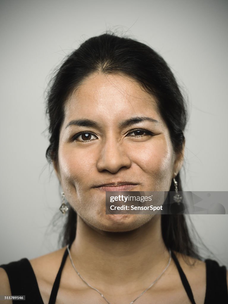 Portrait of a young mixed race woman looking at camera