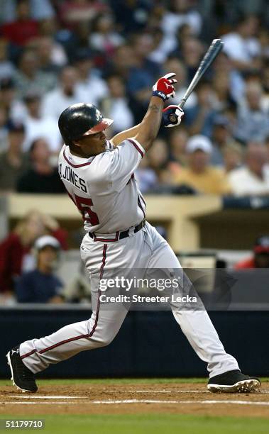 Centerfielder Andruw Jones of the Atlanta Braves hits a home run in the second inning of the game against the San Diego Padres on August 16, 2004 at...