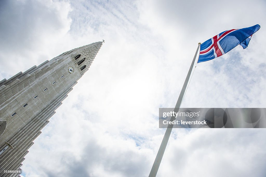 Icelandic flag flying and Hallgrimskirkja church