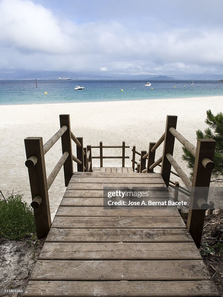 Wooden stairs to the beach in the Cies Islands