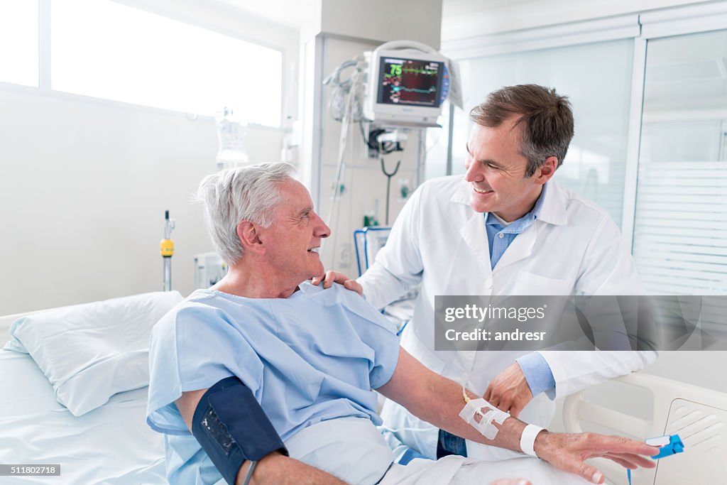 Senior man at the ICU talking to the doctor