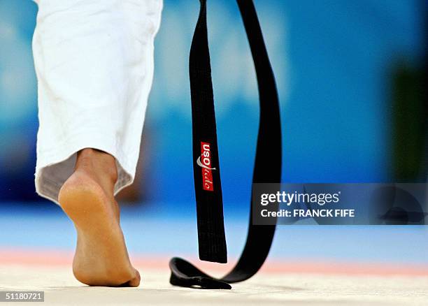 Judoka's black belt is pictured during the women under 63 kg judo competition 17 August 2004 at the Ana Liosia Olympic Hall in Athens during the 2004...