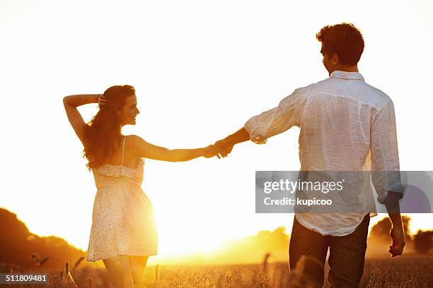 she was even more beautiful than the sunset - rural couple young stock pictures, royalty-free photos & images