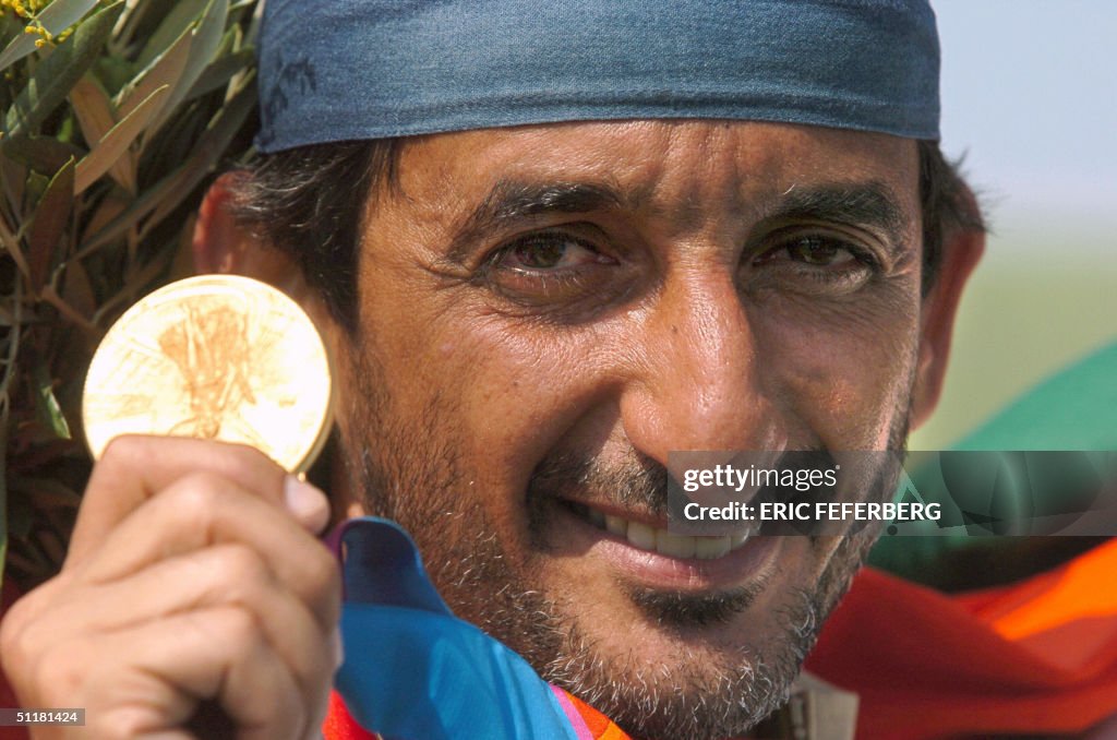 Emirati Sheikh Ahmed AlMaktoum shows his Olympic Games gold medal