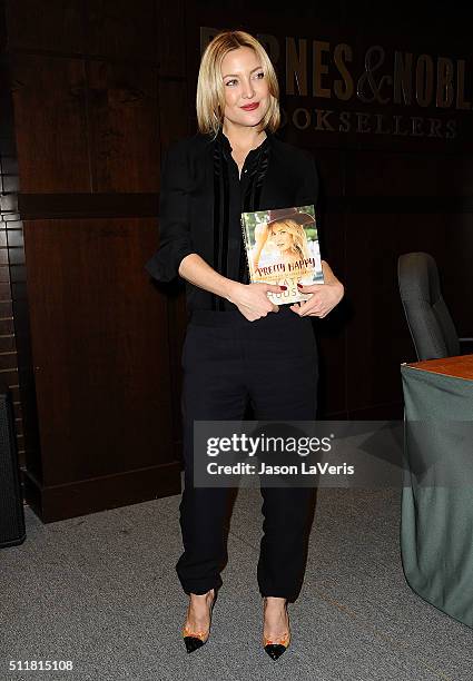 Actress Kate Hudson signs copies of "Pretty Happy: Healthy Ways To Love Your Body" at Barnes & Noble at The Grove on February 22, 2016 in Los...