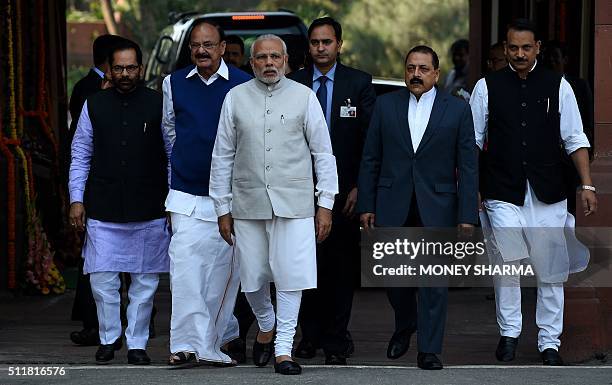 Indian Prime Minister Narendra Modi arrives at the Indian Parliament for the opening of the budget session in New Delhi on February 23, 2016. The...