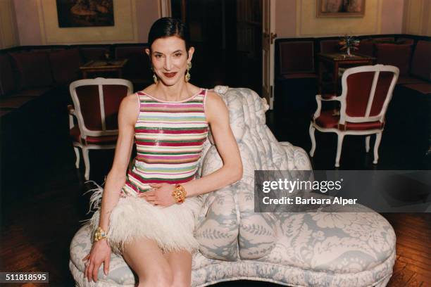 Journalist Amy Fine Collins, writer for 'Vanity Fair' magazine, in one of her vintage Geoffrey Beene dresses at her home in New York City, 1997.