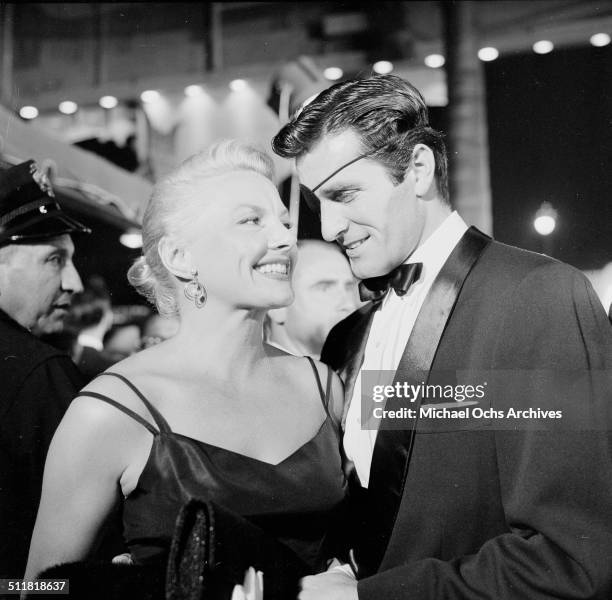 Hugh O'Brian and Phyllis Planchard attend the movie premiere of "Man who knew too much" in Los Angeles,CA.\