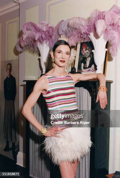 Journalist Amy Fine Collins, writer for 'Vanity Fair' magazine, in one of her vintage Geoffrey Beene dresses at her home in New York City, 1997.