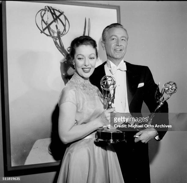Loretta Young and Robert Young pose with their Emmy Awards in Los Angeles,CA.\