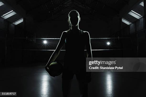 portrait of volleyball player in gym - backlit portrait stock pictures, royalty-free photos & images