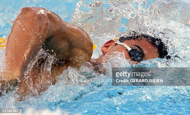 Alexander Popov from Russia competes in the men's 100m freestyle, semi-final 1, at the 2004 Olympic Games at the Olympic Aquatic Center in Athens, 17...