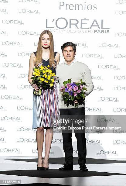 Model Paula Willems and Designer Jorge Vazquez recieve the L'Oreal award during the Mercedes-Benz Madrid Fashion Week Autumn/Winter 2016/2017 at...