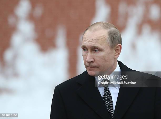 Russian President Vladimir Putin attends a wreath laying ceremony at the Unknown Soldier Tomb in front of the Kremlin on February 23, 2016 in Moscow,...