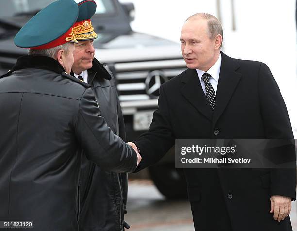 Russian President Vladimir Putin attends a wreath laying ceremony at the Unknown Soldier Tomb in front of the Kremlin on February 23, 2016 in Moscow,...