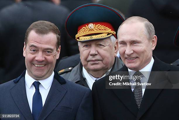 Russian President Vladimir Putin and Prime Minister Dmitry Medvedev during a wreath laying ceremony at the Unknown Soldier Tomb in front of the...