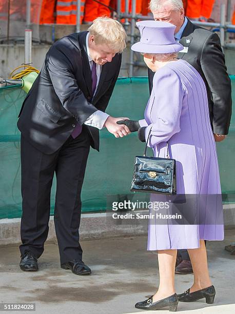 Queen Elizabeth II is greeted by Mayor of London Boris Johnson as she visits the Crossrail Station site at Bond Street Crossrail on February 23, 2016...
