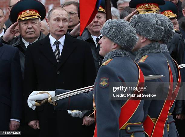 Russian President Vladimir Putin attends a wreath laying ceremony at the Unknown Soldier Tomb in front of the Kremlin on February 23, 2016 in Moscow,...