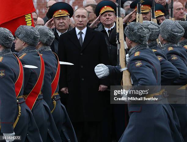 Russian President Vladimir Putin attends a wreath laying ceremony at the Unknown Soldier Tomb in front of the Kremlin on February 23, 2016 in Moscow,...