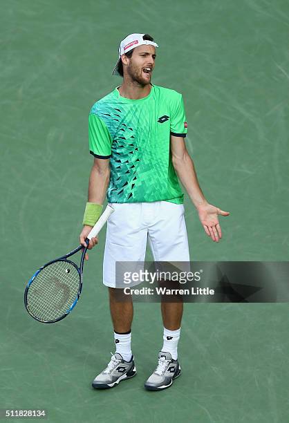 Joao Sousa of Portugal in action against Tomas Berdych of Czech Republic during day four of the ATP Dubai Duty Free Tennis Championship at the Dubai...
