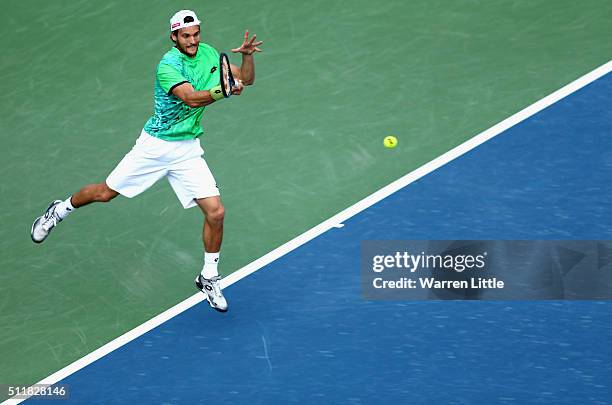 Joao Sousa of Portugal in action against Tomas Berdych of Czech Republic during day four of the ATP Dubai Duty Free Tennis Championship at the Dubai...