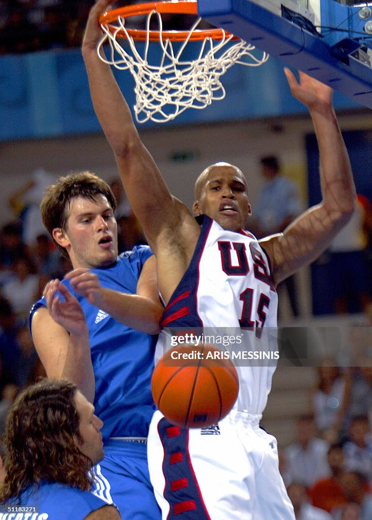 USA's Richard Jefferson (R) vies for the