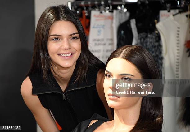 Kendall Jenner visits her new waxwork at the Madame Tussauds London Fashion Week Experience at Madame Tussauds on February 23, 2016 in London,...