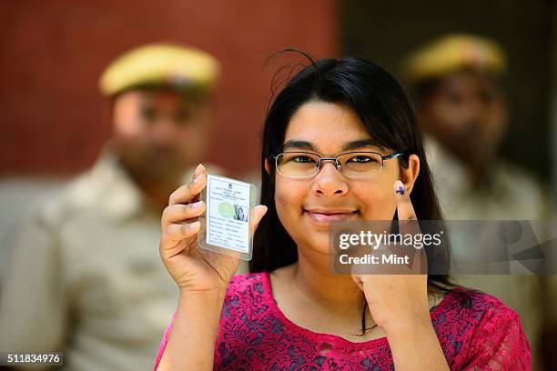Simran Saxena showing the mark after casting her vote first time for general election of the 16th Lok Sabha 2014 on April 10, 2014 in New Delhi,...