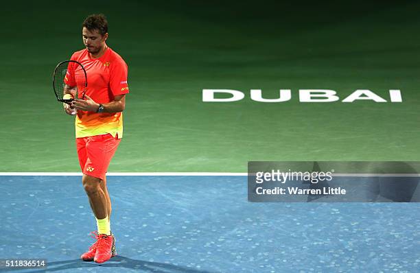 Stan Wawrinka of Switzerland breaks his racket in his match against Sergiy Stakhovsky of Ukraine during day four of the ATP Dubai Duty Free Tennis...