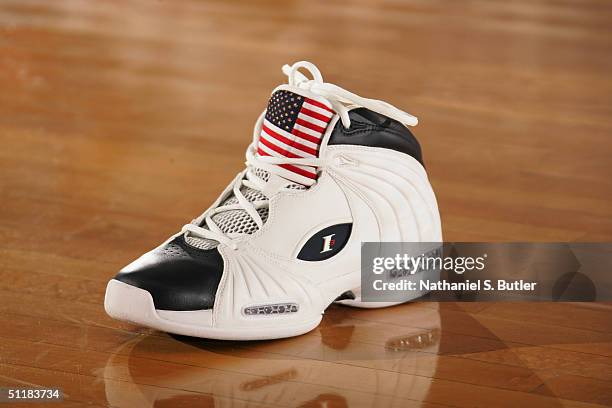 The left Reebok shoe that Allen Iverson of the USA Olympic Men's Basketball Team wears is displayed on the court during day two of practices in...