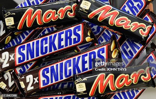 Mars and Snickers chocolate bars are pictured in a shop in Martelange, Belgium on February 23, 2016. Confectioner Mars said on February 23, 2016 it...