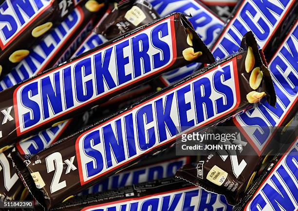 Snickers chocolate bars are pictured in a shop in Martelange, Belgium on February 23, 2016. Confectioner Mars said on February 23, 2016 it was...