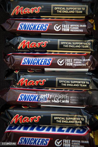 In this photo illustration Mars and Snickers chocolate bars are seen on February 23, 2016 in Bristol, England. The Mars company, which owns both...