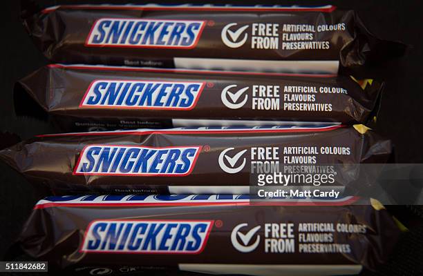 In this photo illustration Snickers chocolate bars are seen on February 23, 2016 in Bristol, England. The Mars company, which owns both brands, has...
